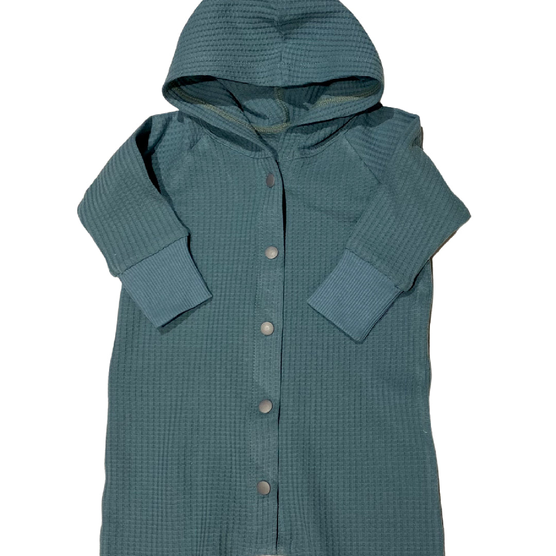 Combishort bleu/vert en tricot gaufré, capuche, boutons-pression sur le devant, manches longues raglan, barboteuse une pièce